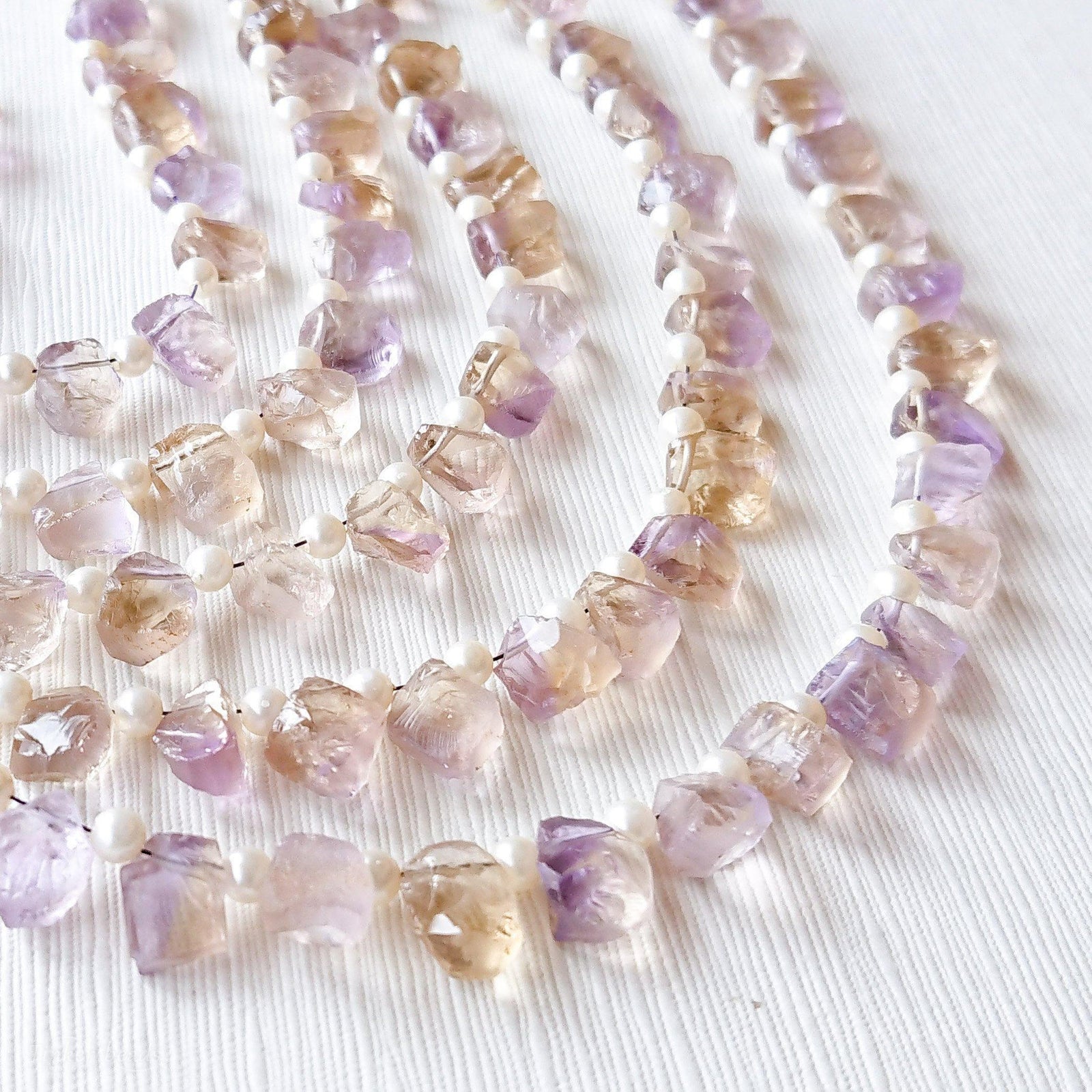 アメトリン 10mmラフドロップ – Tinker*beads.jp